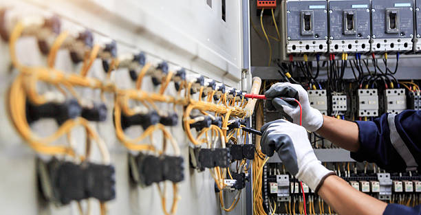 Professional Electrician technician working in East Quogue, NY